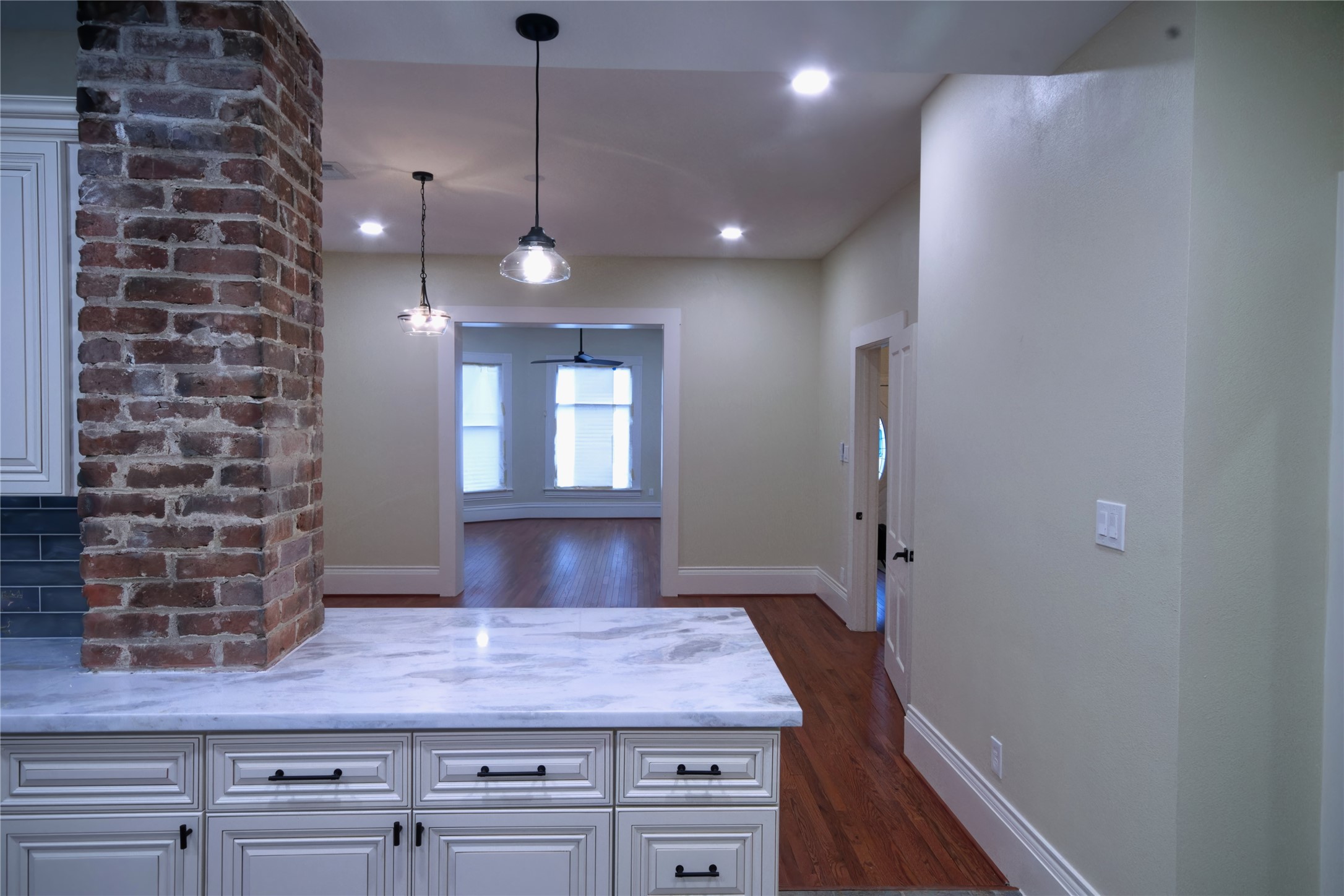 505 Winnie Street Houston, TX 77009 - Photo 13 of 29 The view of the dining room and living room from the kitchen.