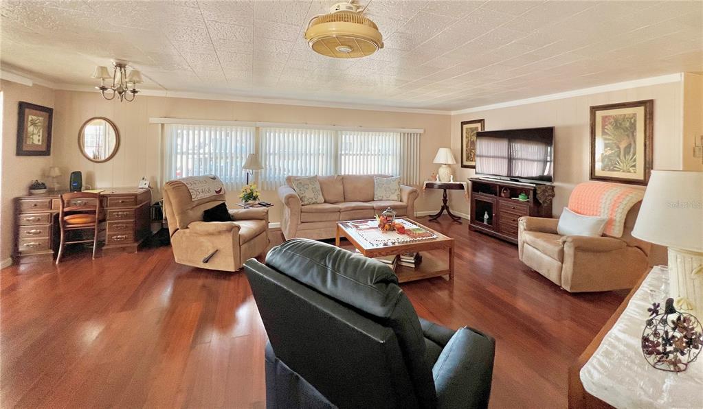 1100 South Belcher Road, Unit 719 Largo, FL 33771 - Photo 34 of 60 a living room with furniture and a window