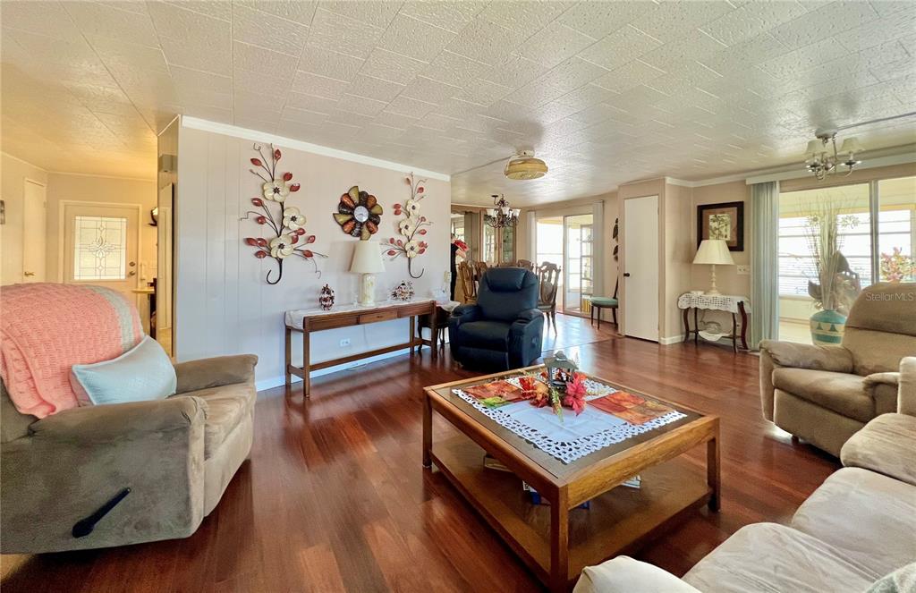 1100 South Belcher Road, Unit 719 Largo, FL 33771 - Photo 38 of 60 a living room with furniture and a rug
