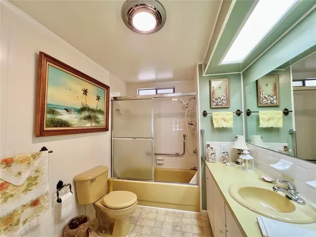 a bedroom with a bed and a cabinets