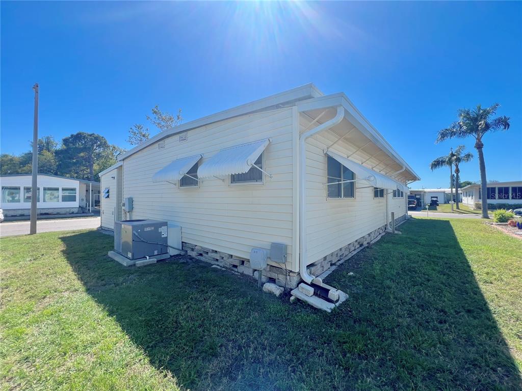 1100 South Belcher Road, Unit 719 Largo, FL 33771 - Photo 9 of 60 a view of a backyard with a garden