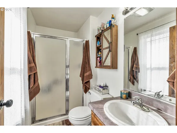 a workspace with furniture hardwood and a window