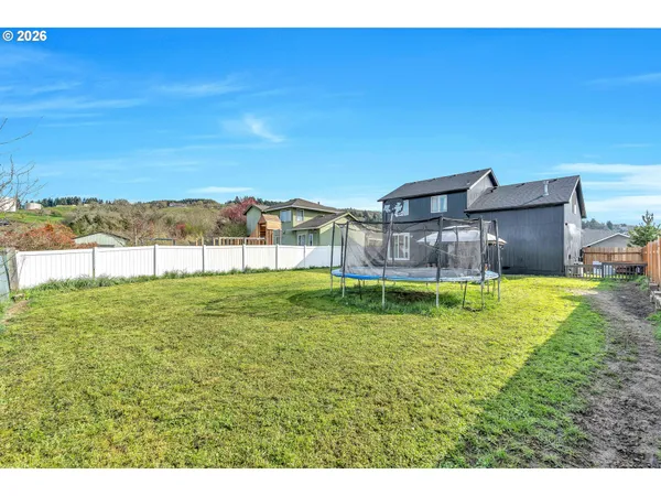 a house view with a garden space