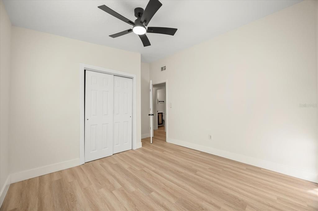 115 West Fillmore Avenue Orlando, FL 32809 - Photo 20 of 23 wooden floor in an empty room