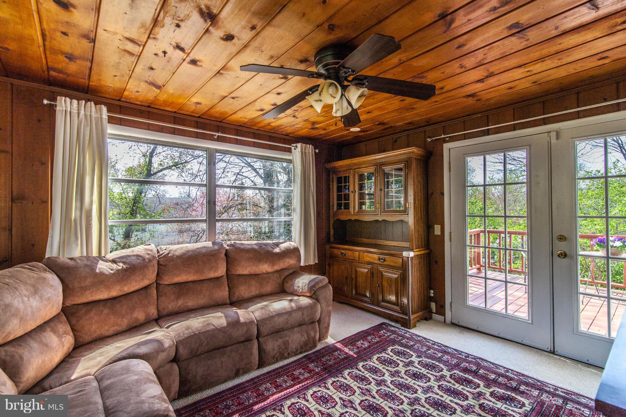 8514 Grubb Road Chevy Chase, MD 20815 - Photo 16 of 30 Family room with glass french doors to the deck