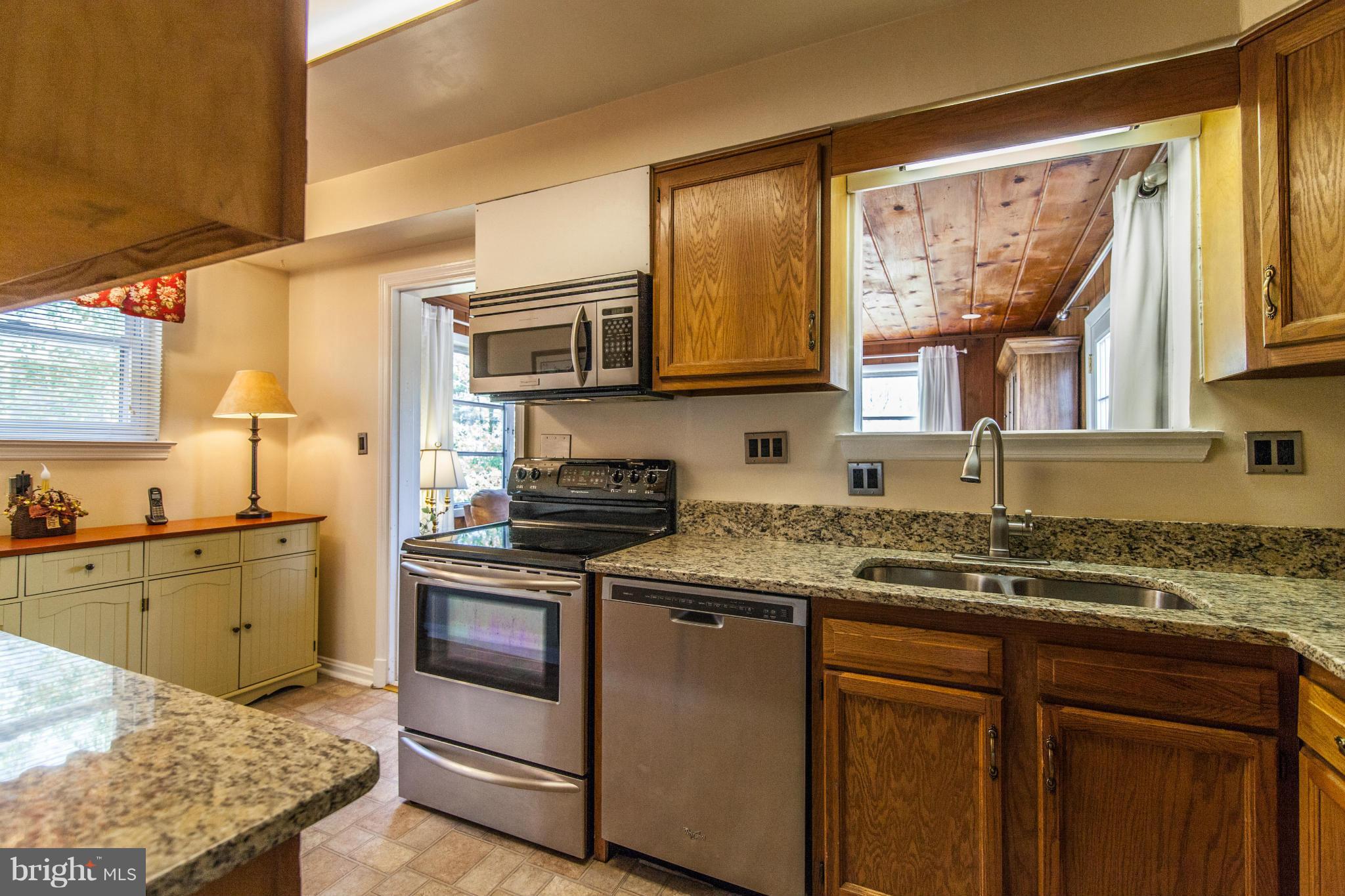 8514 Grubb Road Chevy Chase, MD 20815 - Photo 8 of 30 Kitchen towards the family room