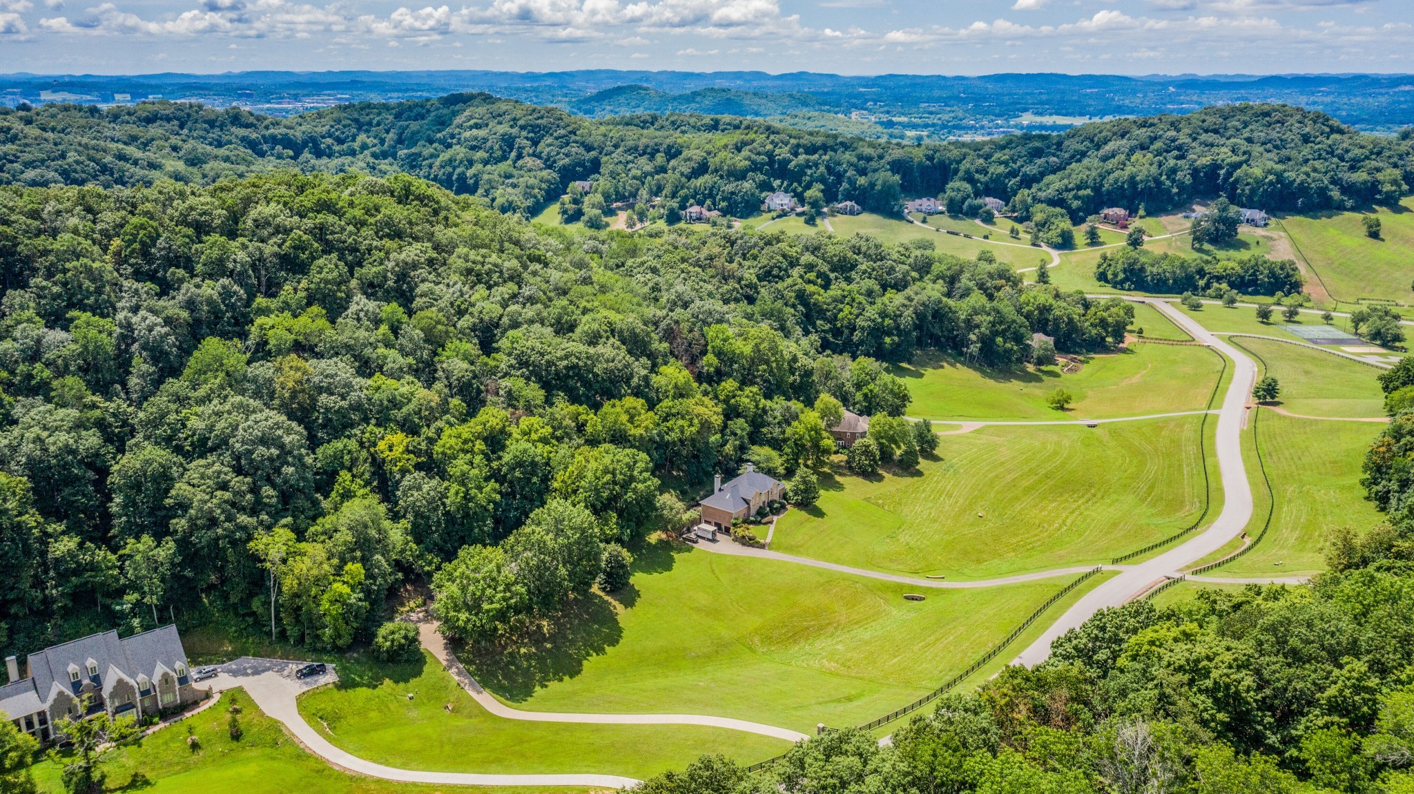 3026 Smith Lane Franklin, TN 37069 - Photo 1 of 39 an aerial view of a swimming pool and mountain view