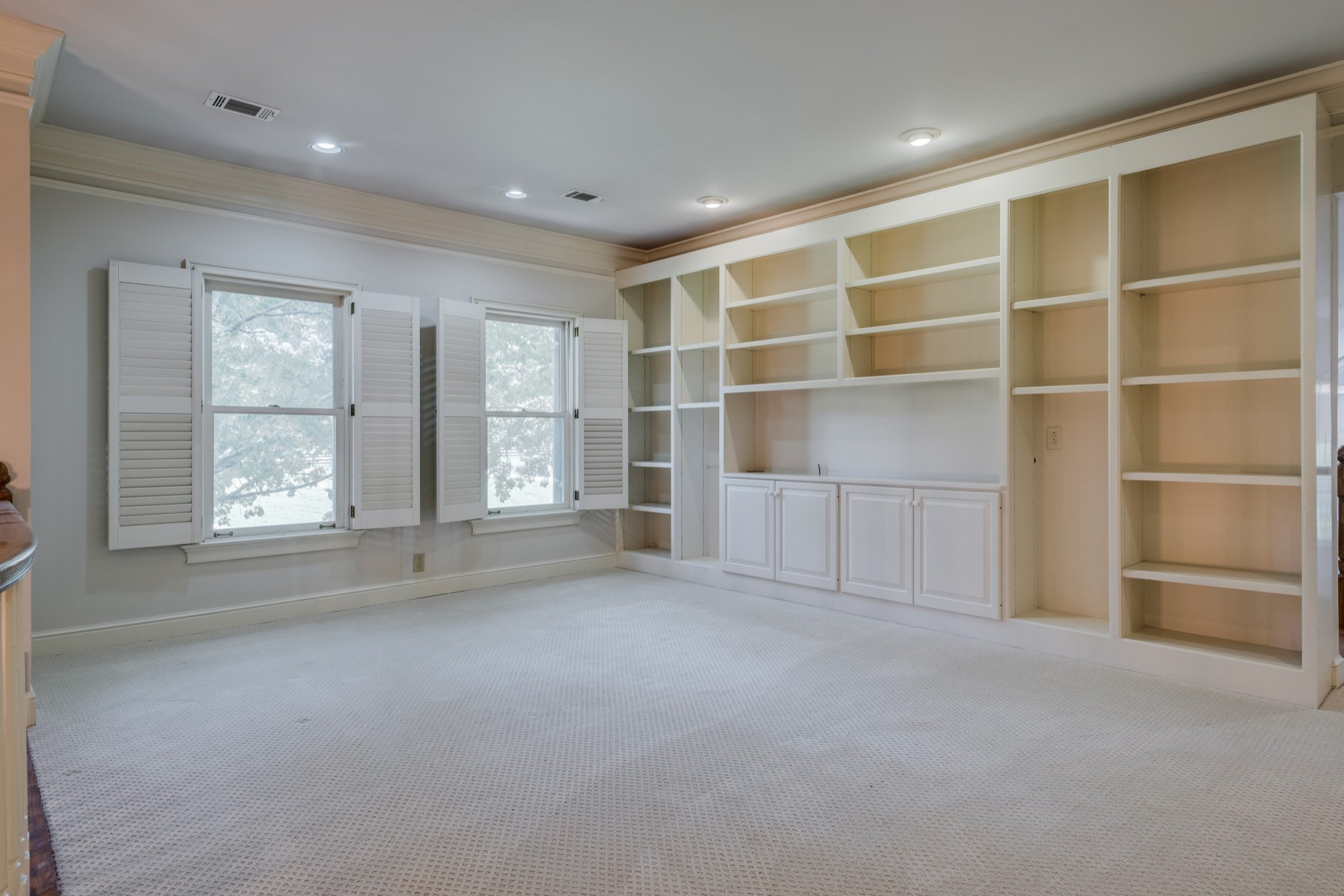 3026 Smith Lane Franklin, TN 37069 - Photo 23 of 39 an empty room with a empty shelves and natural light