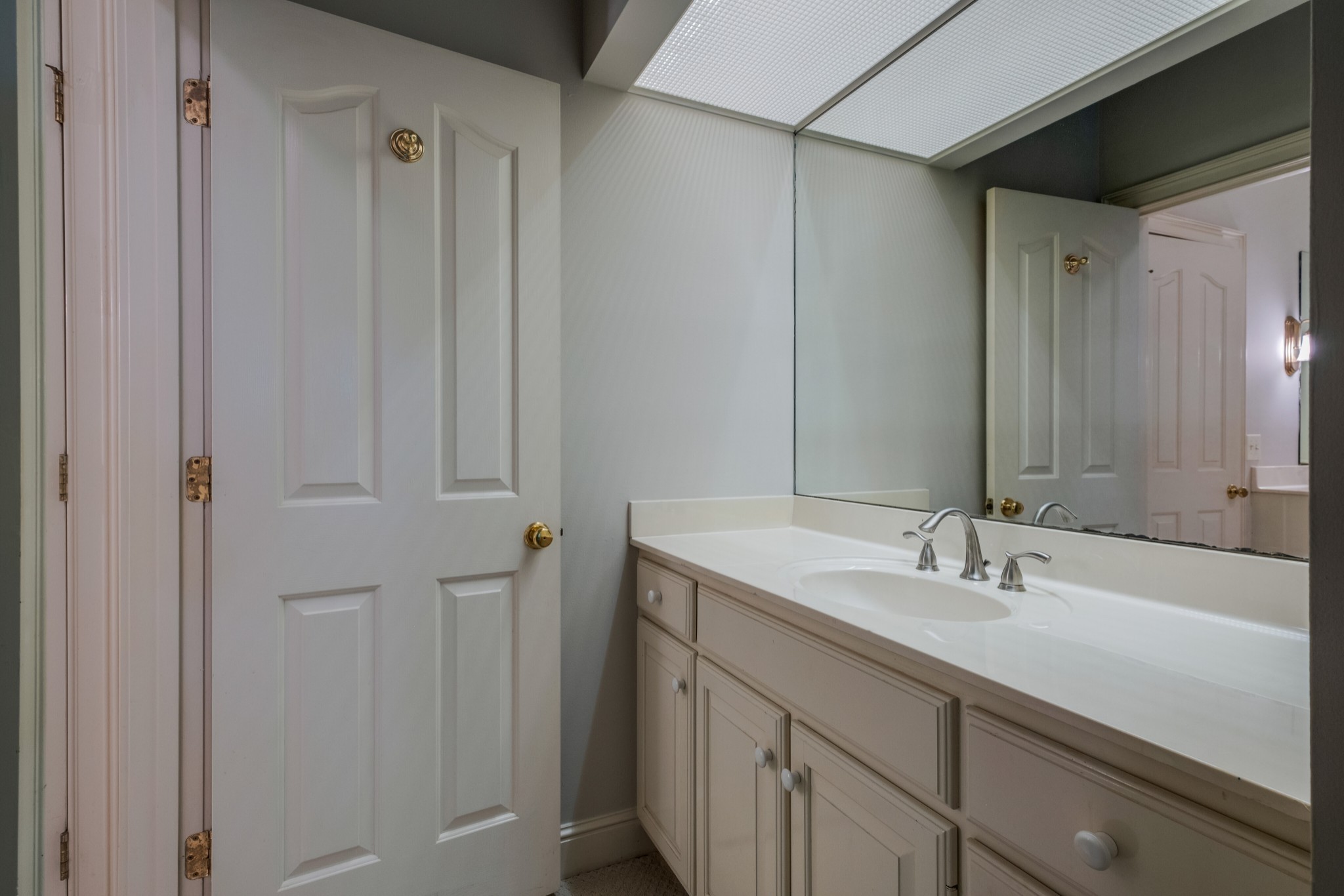 3026 Smith Lane Franklin, TN 37069 - Photo 30 of 39 a bathroom with a sink and a mirror