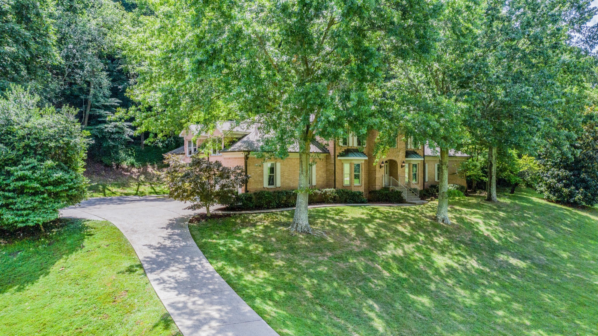 3026 Smith Lane Franklin, TN 37069 - Photo 5 of 39 a house with a tree in front of it