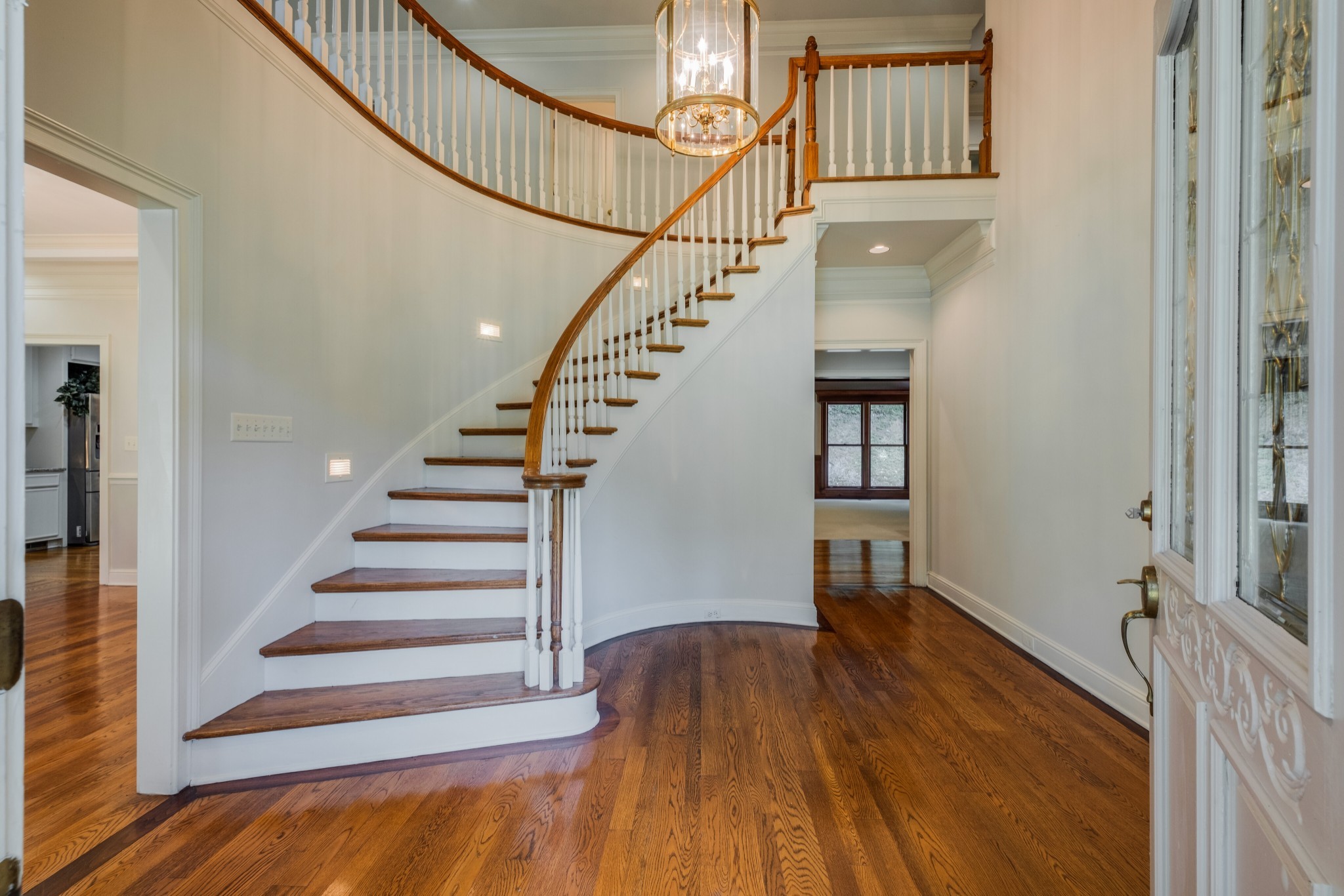 3026 Smith Lane Franklin, TN 37069 - Photo 7 of 39 a view of entryway and hall with wooden floor