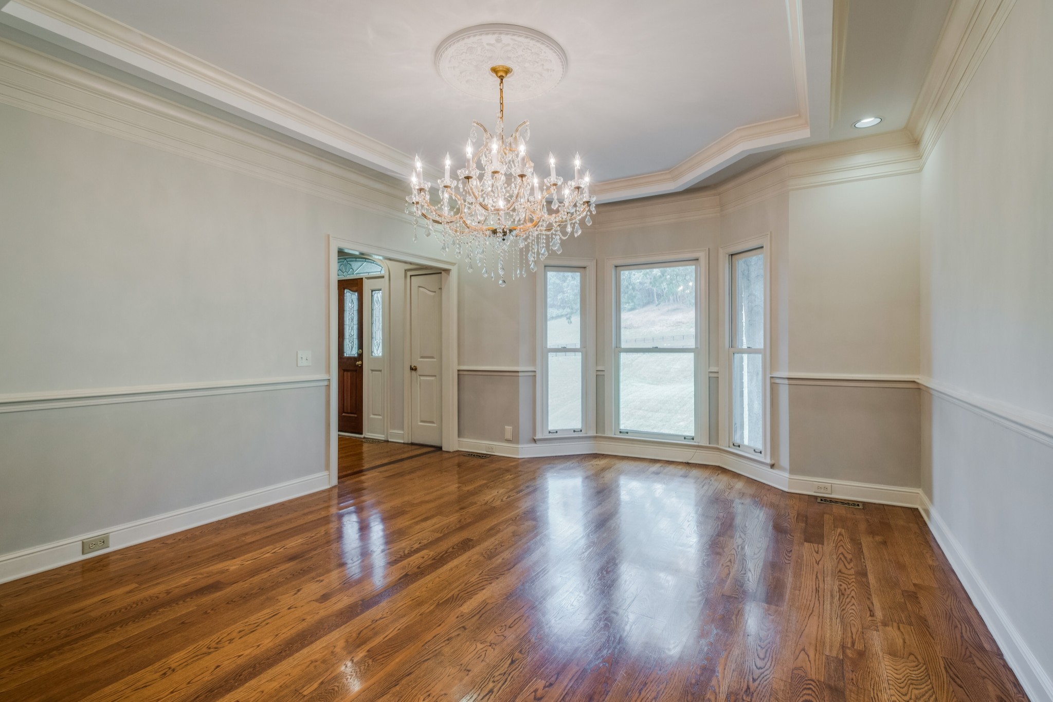 3026 Smith Lane Franklin, TN 37069 - Photo 9 of 39 a view of an empty room with wooden floor and a window