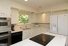 12908 Gent Road Reisterstown, MD 21136 - Photo 11 of 29 a kitchen with a sink cabinets and appliances
