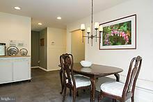 12908 Gent Road Reisterstown, MD 21136 - Photo 12 of 29 a view of a dining room with furniture and a chandelier