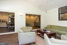 12908 Gent Road Reisterstown, MD 21136 - Photo 15 of 29 a living room with furniture and a flat screen tv