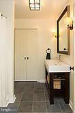 12908 Gent Road Reisterstown, MD 21136 - Photo 19 of 29 a bathroom with a sink and a mirror