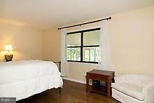 12908 Gent Road Reisterstown, MD 21136 - Photo 20 of 29 a bedroom with a bed and a window