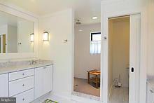 12908 Gent Road Reisterstown, MD 21136 - Photo 26 of 29 a bathroom with a granite countertop sink mirror and toilet