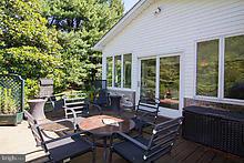 12908 Gent Road Reisterstown, MD 21136 - Photo 28 of 29 a outdoor space with patio the couches and a dining table with garden view