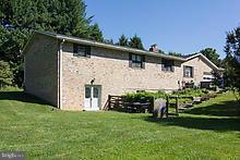 12908 Gent Road Reisterstown, MD 21136 - Photo 29 of 29 a front view of a house with garden