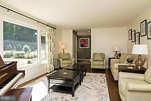 12908 Gent Road Reisterstown, MD 21136 - Photo 7 of 29 a living room with furniture and a floor to ceiling window
