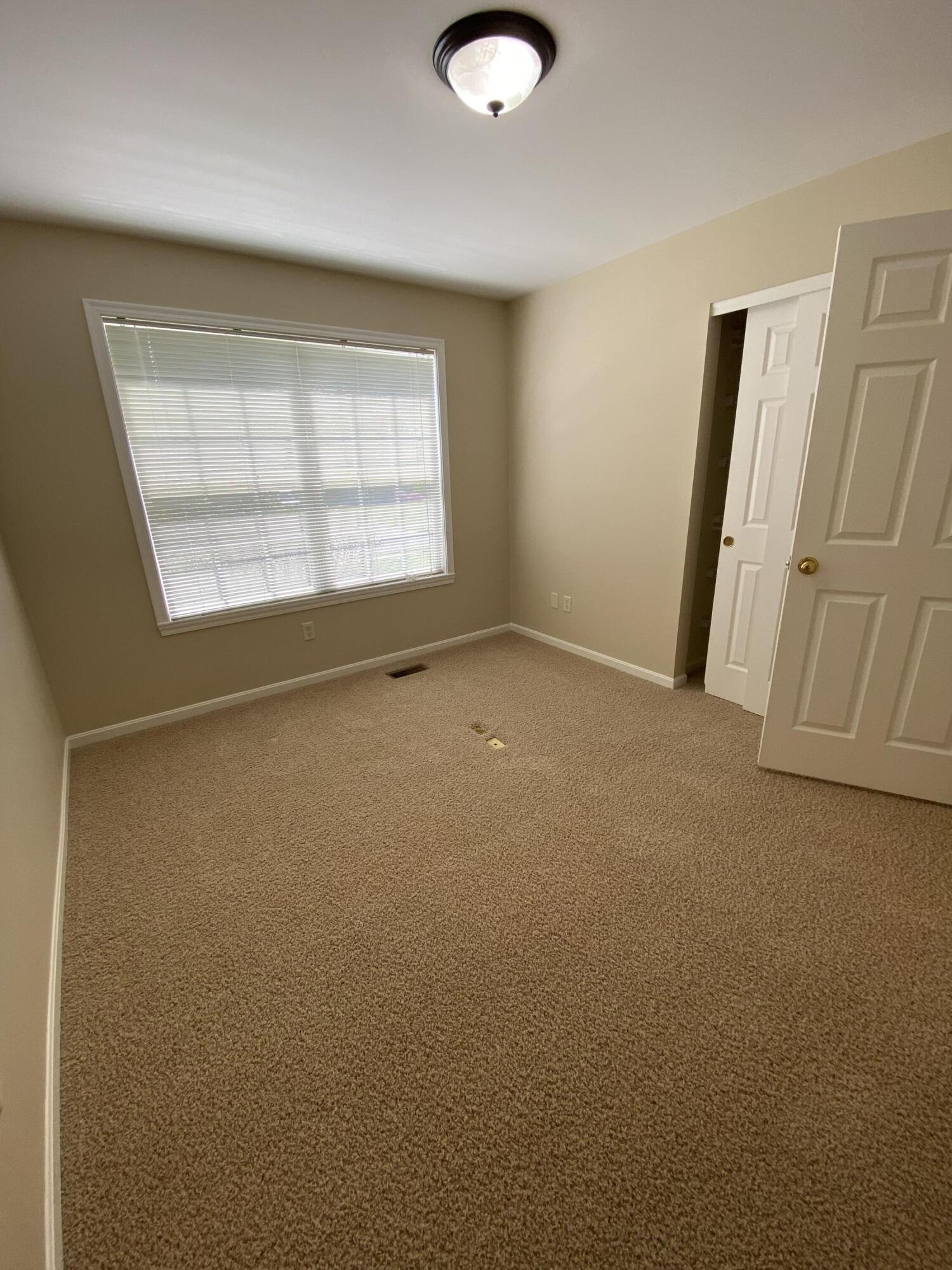 8964 Richmond Road Union, KY 41091 - Photo 34 of 48 Bedroom 2 w/ closet shelving set up for an office.