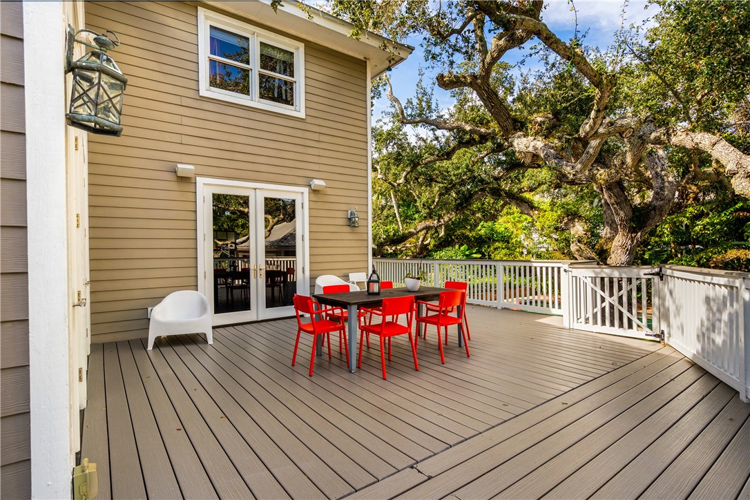 975 Riomar Drive Vero Beach, FL 32963 - Photo 15 of 34 a view of a deck with table and chairs and wooden floor