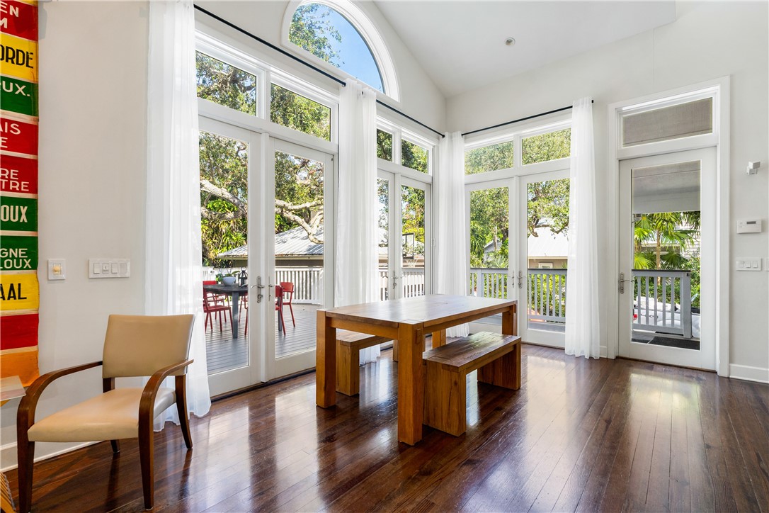 975 Riomar Drive Vero Beach, FL 32963 - Photo 25 of 34 a large living room with a table chairs and a large window