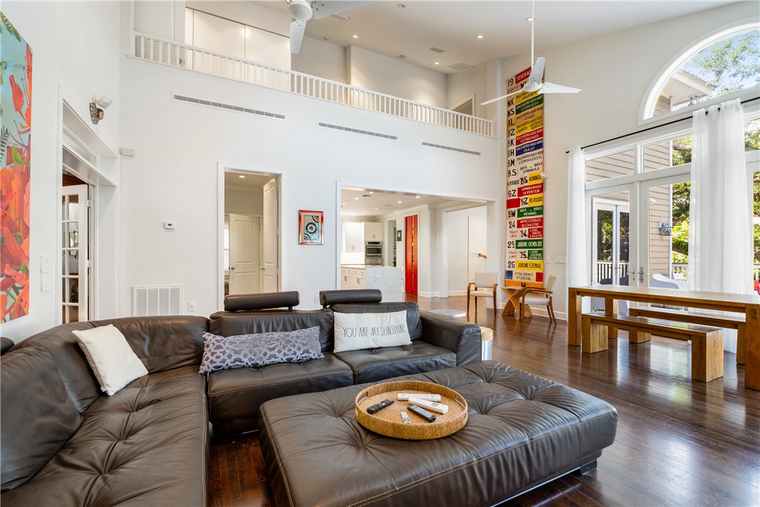 975 Riomar Drive Vero Beach, FL 32963 - Photo 27 of 34 a living room with furniture kitchen view and a large window