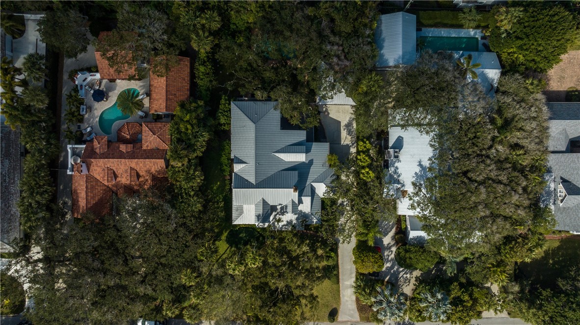 975 Riomar Drive Vero Beach, FL 32963 - Photo 34 of 34 an aerial view of residential house with outdoor space and trees all around