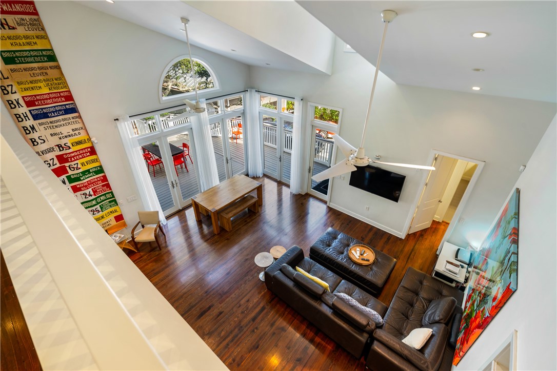 975 Riomar Drive Vero Beach, FL 32963 - Photo 9 of 34 a living room with furniture and a flat screen tv