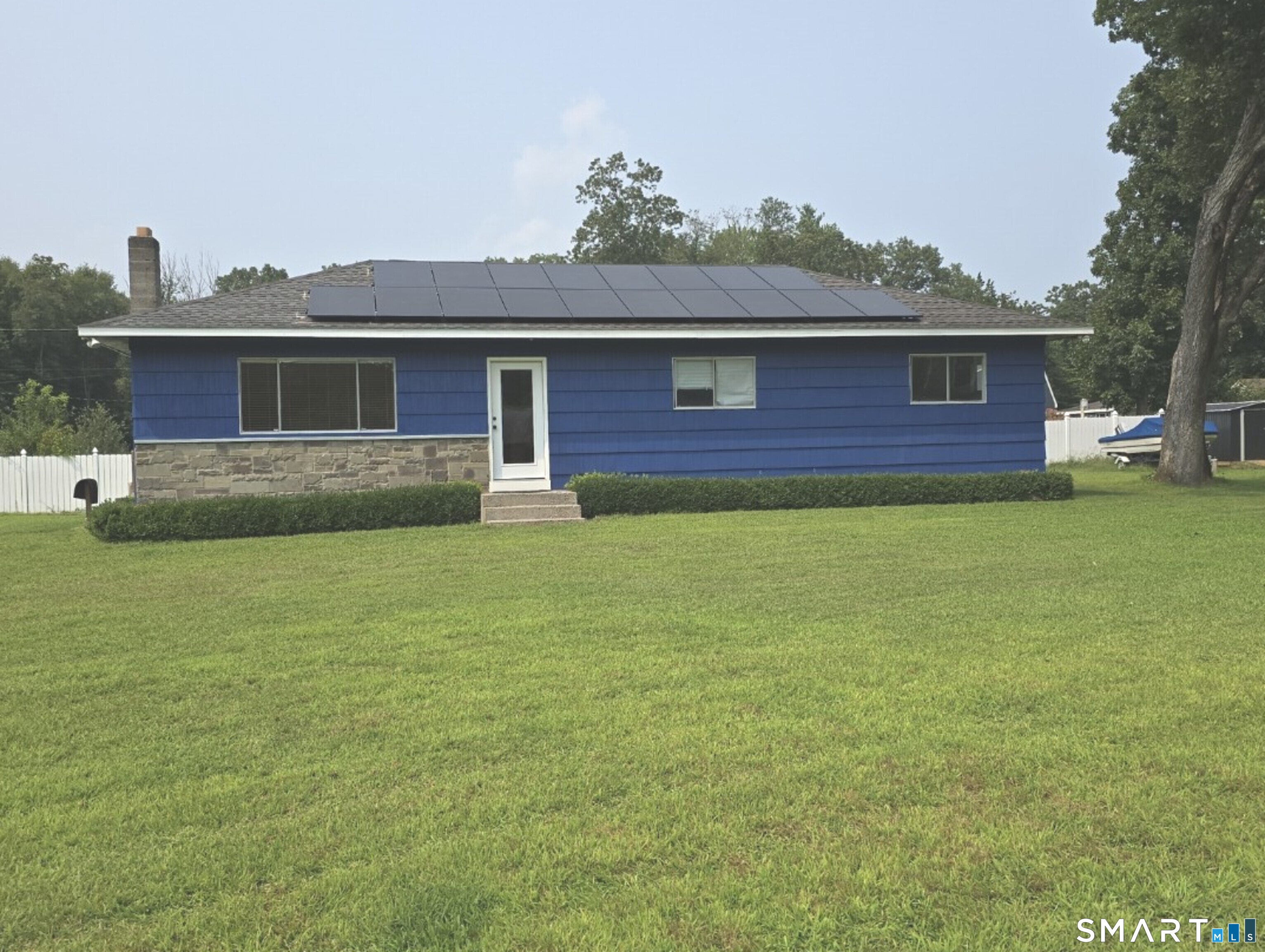 4 Shady Rest Boulevard Newtown, CT 06482 - Photo 1 of 34 a view of a yard in front of a house with plants