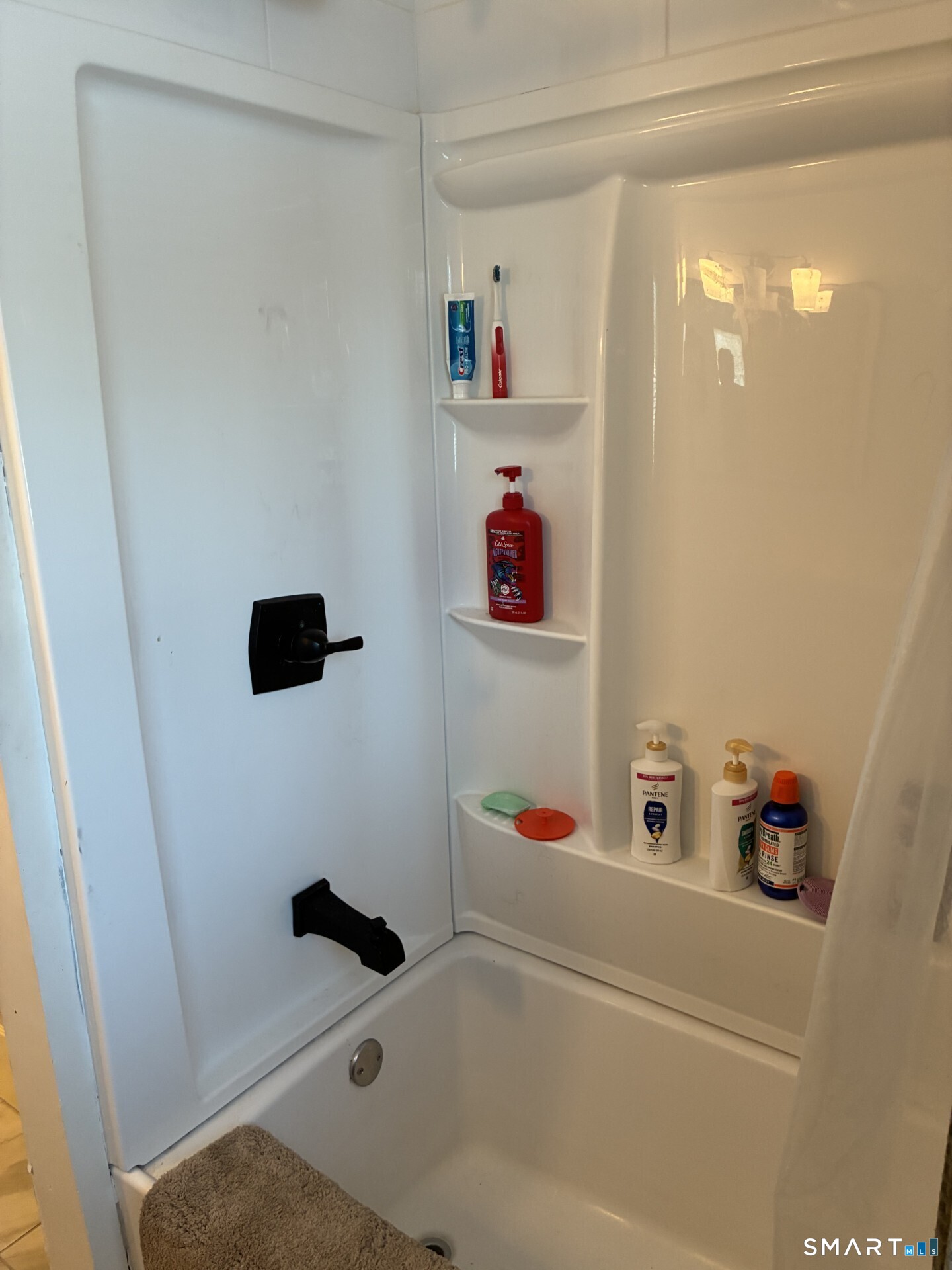 4 Shady Rest Boulevard Newtown, CT 06482 - Photo 13 of 34 a bathroom with a bathtub and shower