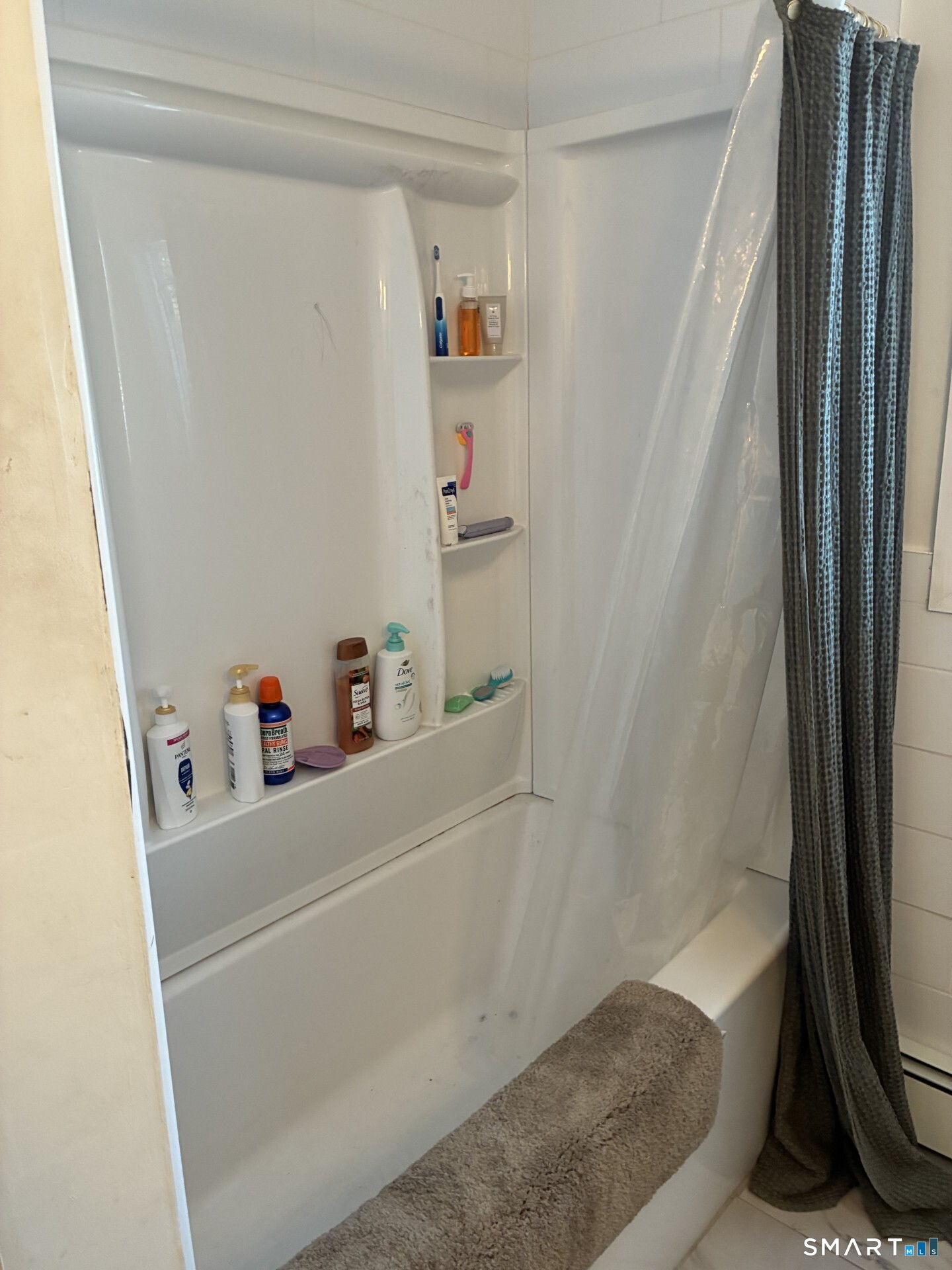 4 Shady Rest Boulevard Newtown, CT 06482 - Photo 14 of 34 a bathroom with a bathtub and a shower