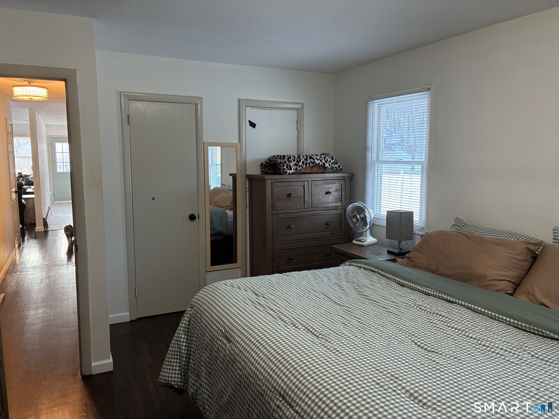 4 Shady Rest Boulevard Newtown, CT 06482 - Photo 16 of 34 a bedroom with a bed and wooden floor