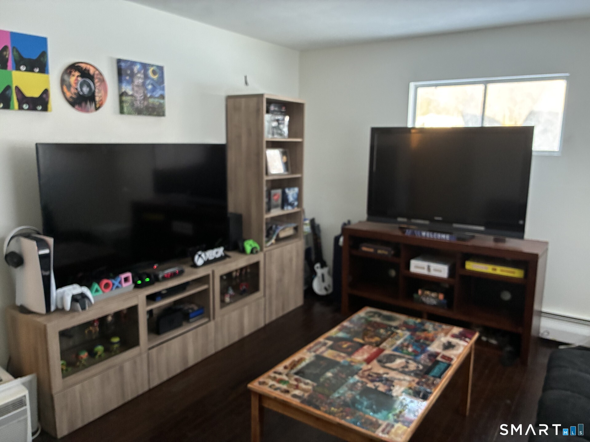 4 Shady Rest Boulevard Newtown, CT 06482 - Photo 19 of 34 a room with furniture and flat screen tv