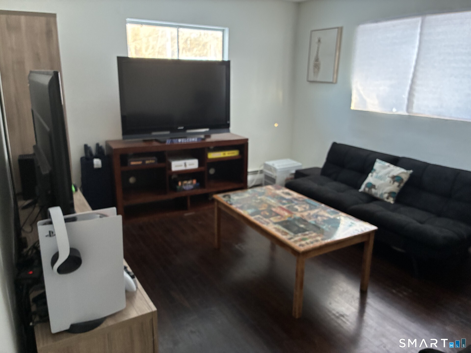 4 Shady Rest Boulevard Newtown, CT 06482 - Photo 21 of 34 a living room with furniture and a flat screen tv