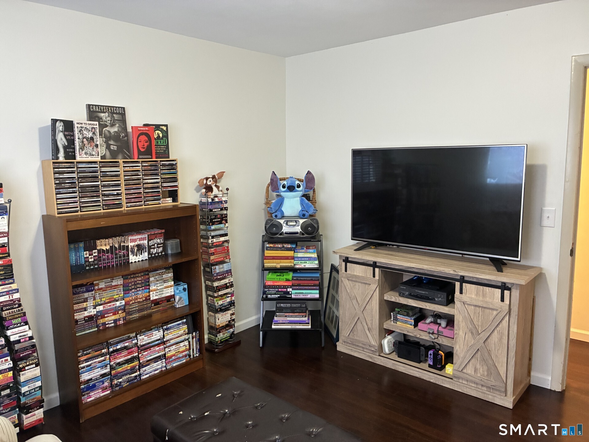 4 Shady Rest Boulevard Newtown, CT 06482 - Photo 23 of 34 a room with furniture and a flat screen tv