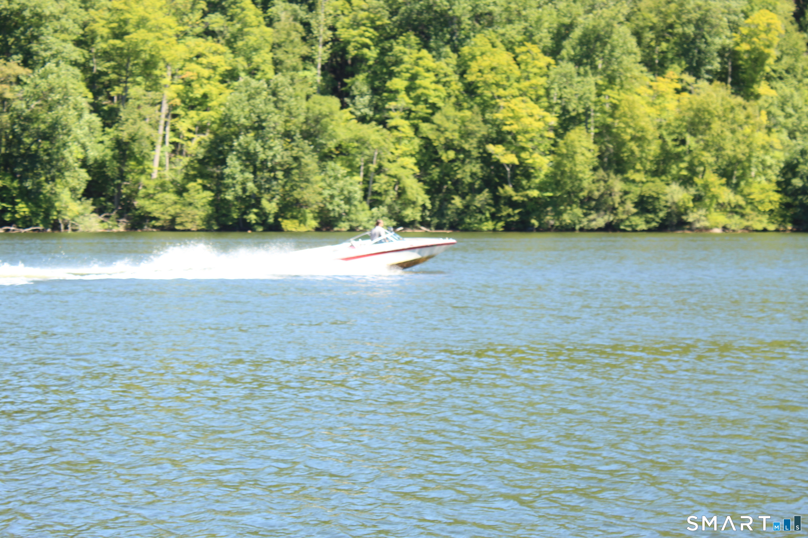 4 Shady Rest Boulevard Newtown, CT 06482 - Photo 33 of 34 a view of an empty room with a window