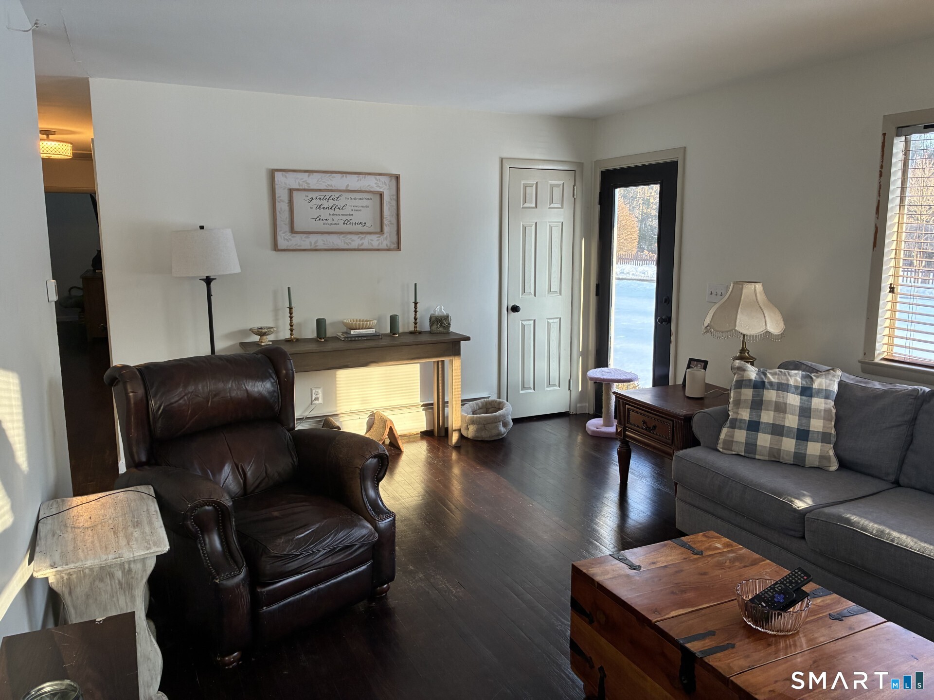 4 Shady Rest Boulevard Newtown, CT 06482 - Photo 8 of 34 a living room with furniture and wooden floor
