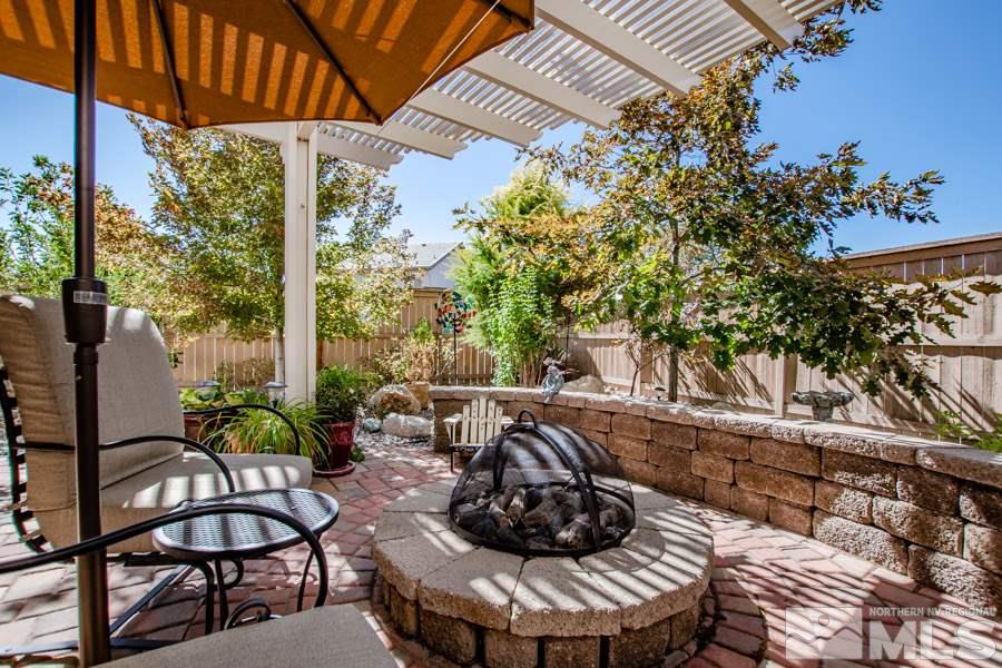 10655 Cedar Bend Court Reno, NV 89521 - Photo 13 of 16 a view of a chairs and table in the patio