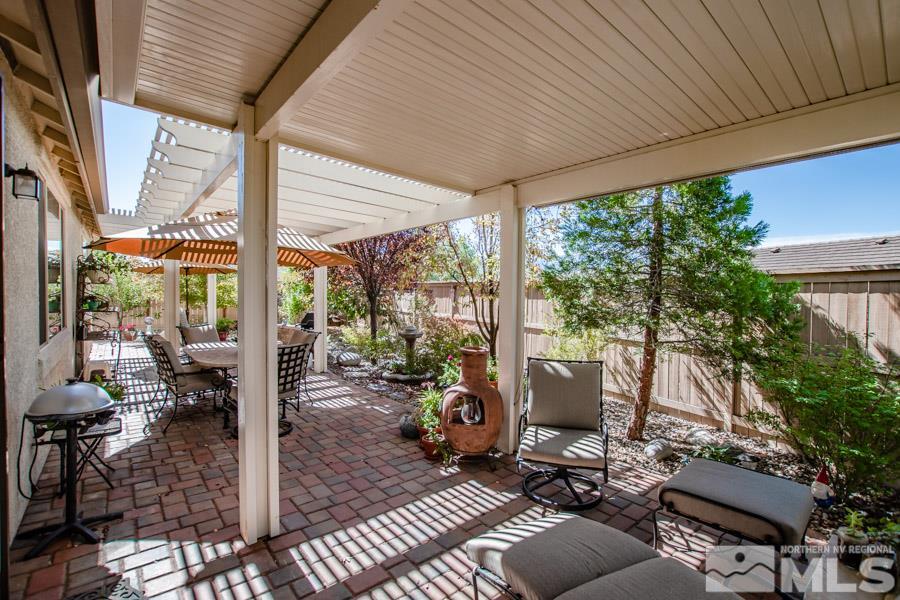 10655 Cedar Bend Court Reno, NV 89521 - Photo 10 of 16 a view of balcony with couch and chairs