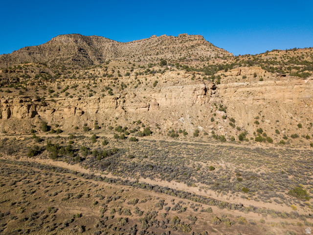 3135 North Thompson Cyn Road Green River, UT 84525 - Photo 5 of 41 View of mountain background featuring rural landscape and a desert landscape