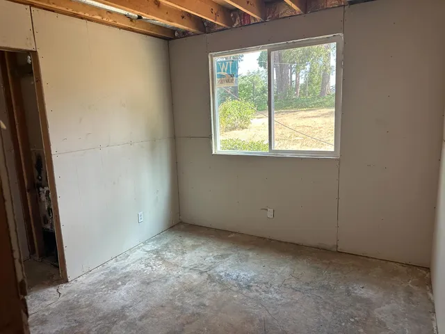 an empty room with a window