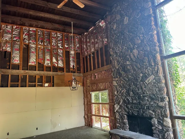 a view of an empty room with a sliding door