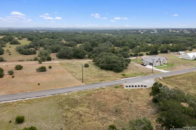 a view of a street with an ocean view