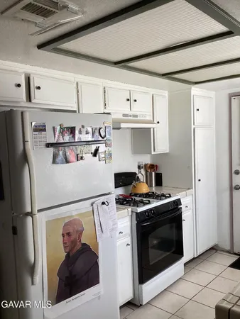 a bedroom with a bed and a bathroom