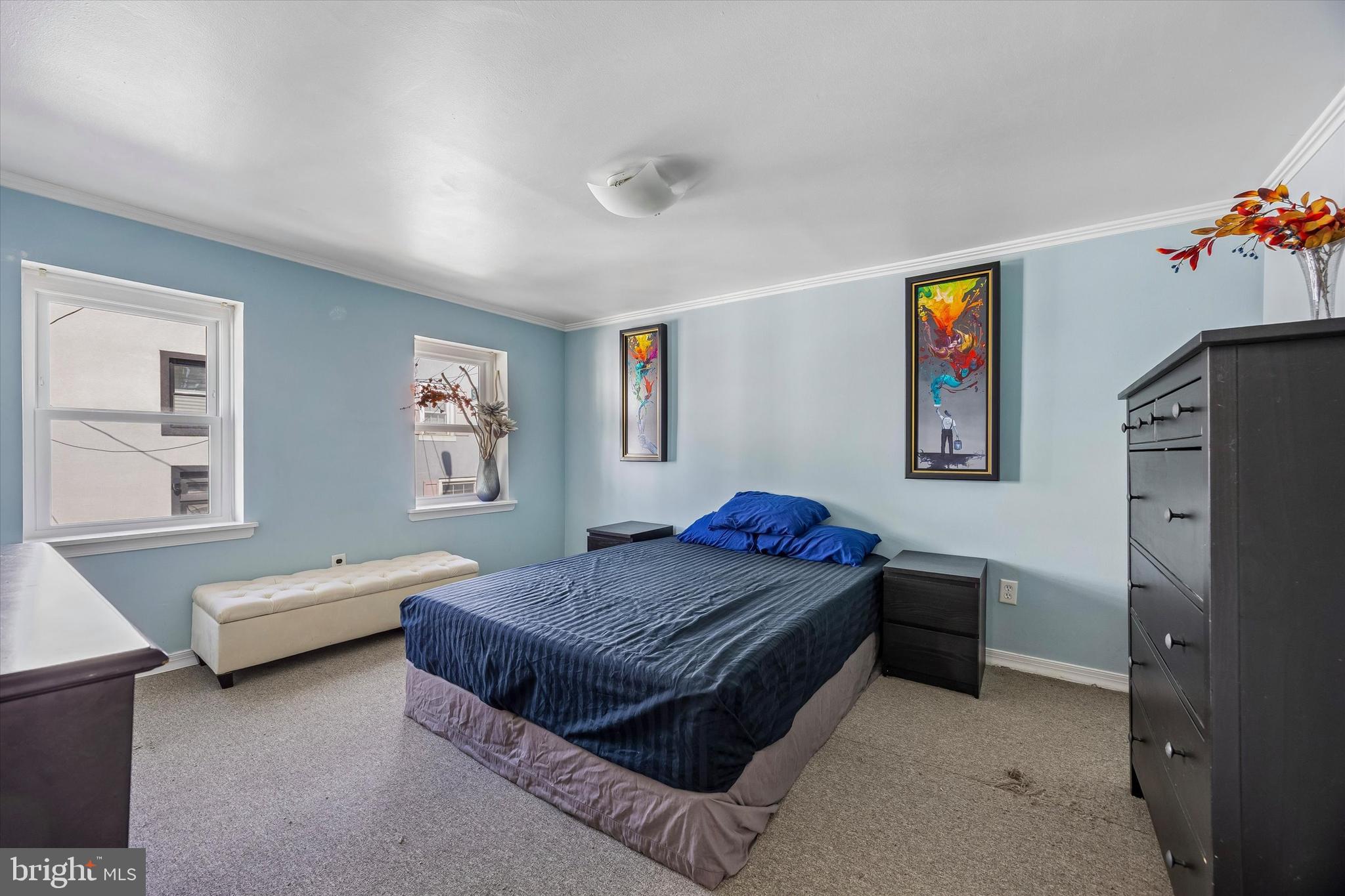 145 Conarroe Street Philadelphia, PA 19127 - Photo 13 of 28 a bedroom with furniture and window