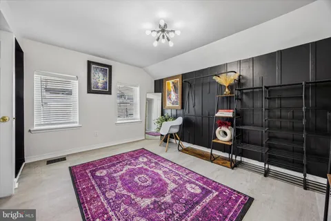 a living room with a couch and a table