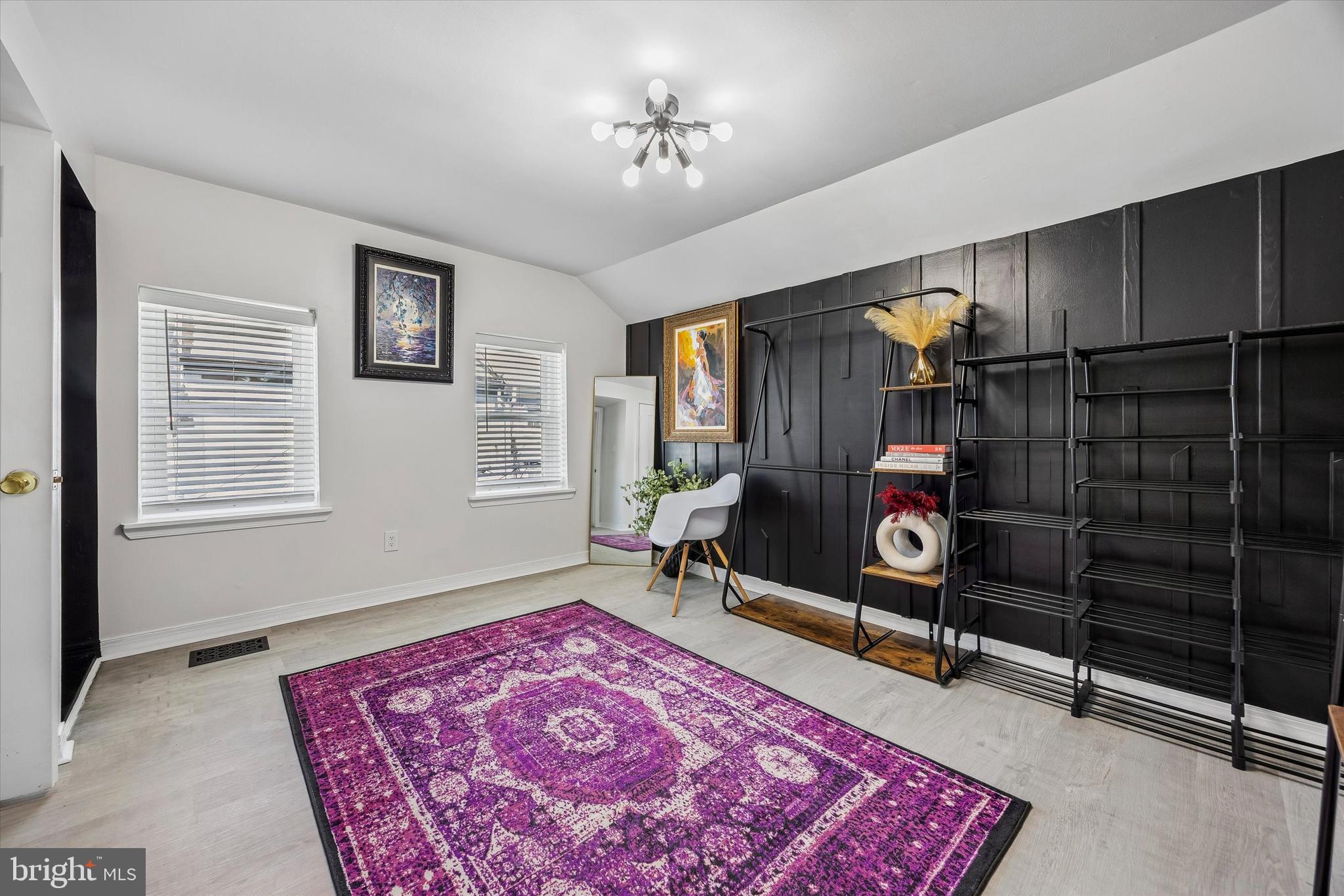 145 Conarroe Street Philadelphia, PA 19127 - Photo 21 of 28 a living room with a couch and a table